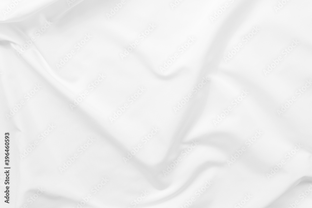 Abstract white fabric texture background. Cloth soft wave. Creases of satin. silk and cotton. Abstract white fabric texture background. Cloth soft wave. Creases of satin. silk and cotton.