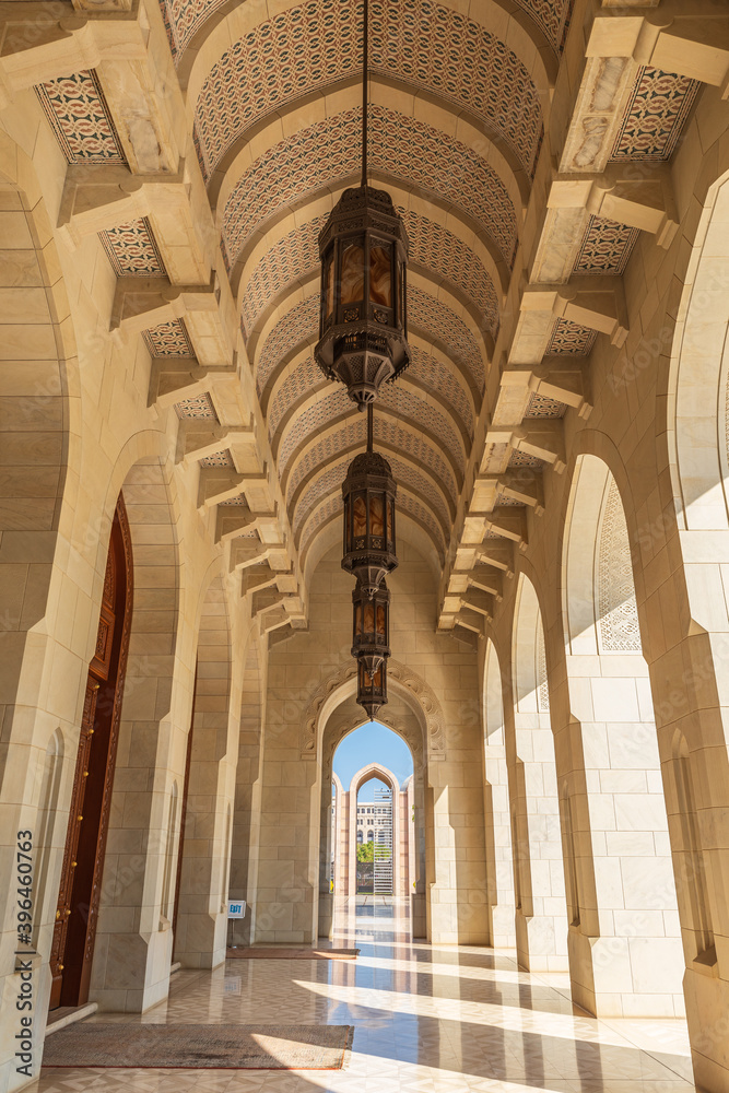 Middle East, Arabian Peninsula, Oman, Muscat. Exterior corridor of Sultan Qaboos Grand Mosque in Muscat.