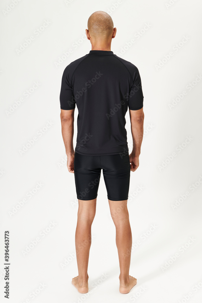 Fototapeta premium Men's black short sleeve swimsuit full body shot