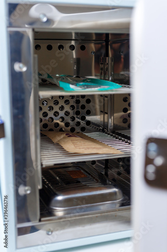 inside the sterilizer. Professional hardware pedicure in a medical salon.