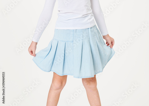 Woman&#39;s blue skirt in studio
