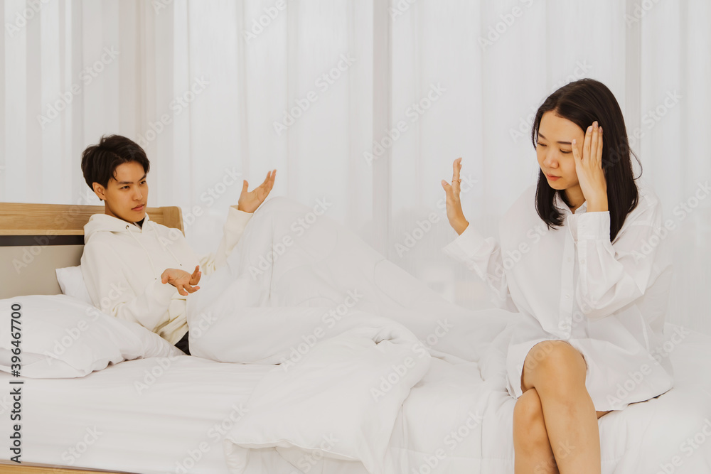 Couples LGBT concept : The girlfriend did not understand, quarreling in the bedroom, did not accept any explanation : Selective Focus Couples LGBT concept : The girlfriend did not understand, quarreling in the bedroom, did not accept any explanation : Selective Focus
