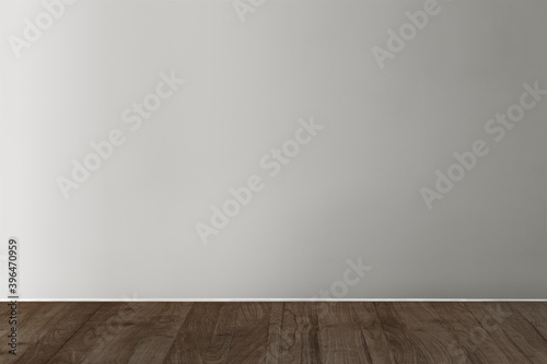 Gray blank concrete wall mockup with a wooden floor © Rawpixel.com