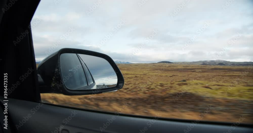 Car Driving Through Icelandic Landscape Car Driving Through Icelandic Landscape