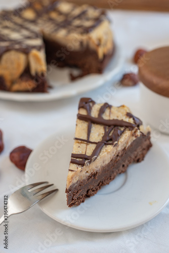 Delicious chestnut cake with almonds and chocolate glaze