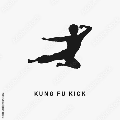 Kung Fu flying kick black silhouette. Chinese martial arts icon sign or symbol. Karate logo. MMA fighter. Jiu Jitsu training. Combat sports fight. Jumping leg attack simple vector illustration.