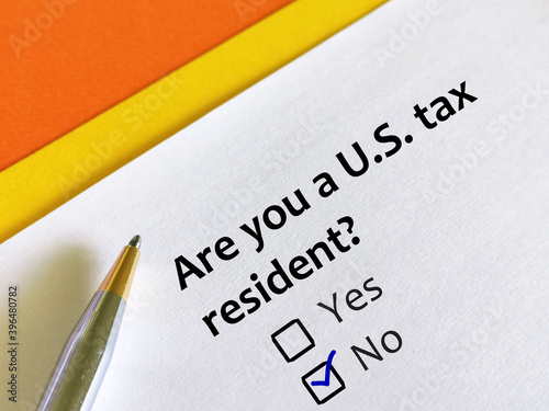 One person is answering question. The person is thinking if he is United states tax resident. He is not US tax resident.
