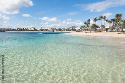 Sunny beach in, costa Teguise, Lanzarote, Canary Islands, Spain. photo