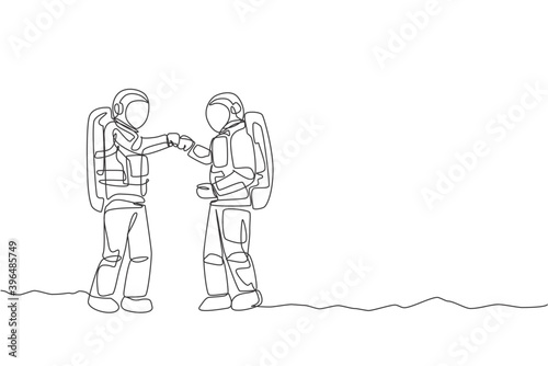 One continuous line drawing of young happy astronaut giving fist bump gesture to his friend in moon surface. Space man deep space concept. Dynamic single line draw design graphic vector illustration