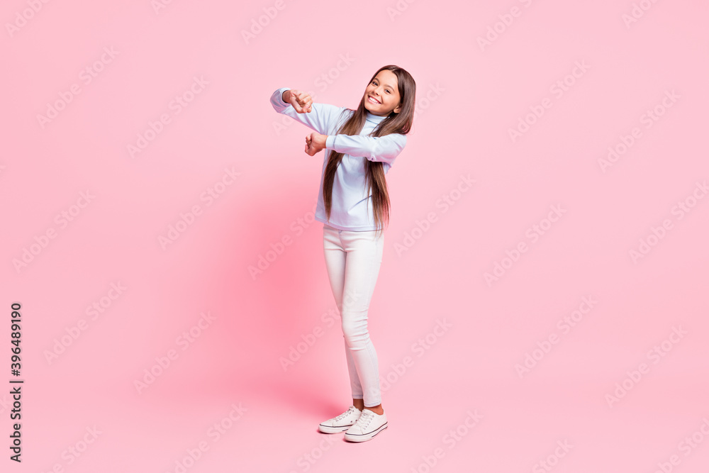 Full length body size view of pretty cheerful girl dancing moving good mood isolated over pink pastel color background Full length body size view of pretty cheerful girl dancing moving good mood isolated over pink pastel color background