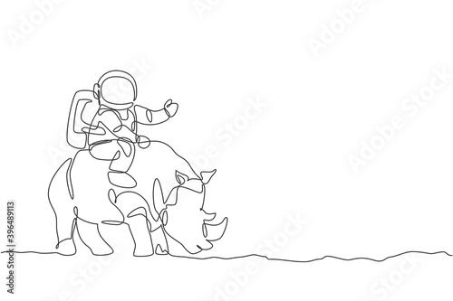 One single line drawing of astronaut riding rhinoceros, wild animal in moon surface vector illustration. Cosmonaut safari journey concept. Modern continuous line draw graphic design