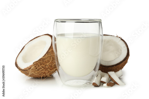 Coconut and glass of coconut milk isolated on white background