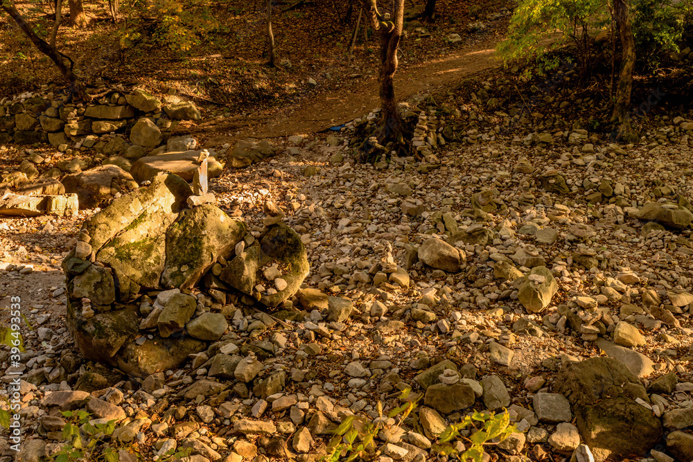 Obraz premium Pebble stack in dry riverbed.