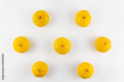 beautiful ripe tangerines on a white background © dyachenkopro