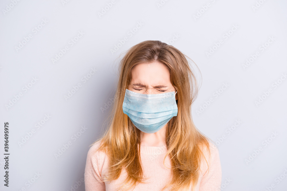 Photo of unhappy sad upset woman wear facial mask closed eyes isolated gray color background Photo of unhappy sad upset woman wear facial mask closed eyes isolated gray color background