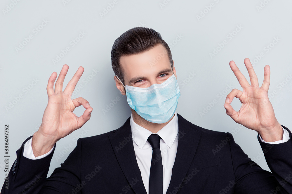 Photo of handsome assistant wear white shirt tie black jacket maskshowing okey isolated gray color background Photo of handsome assistant wear white shirt tie black jacket maskshowing okey isolated gray color background