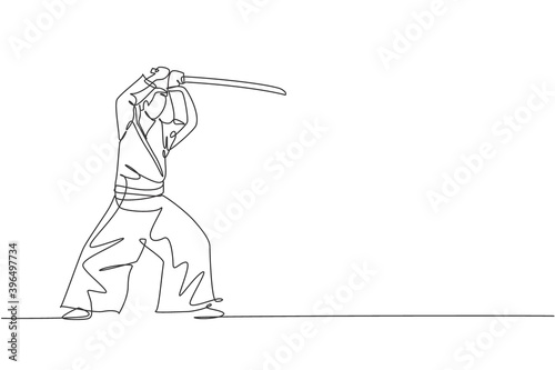 One single line drawing of young energetic man wearing kimono exercise aikido technique with wooden sword in sports hall vector illustration. Healthy sport concept. Modern continuous line draw design