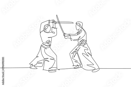 Single continuous line drawing of two sportive men wearing kimono practice aikido sparring fight technique with wooden sword. Japanese martial art concept. One line draw design vector illustration
