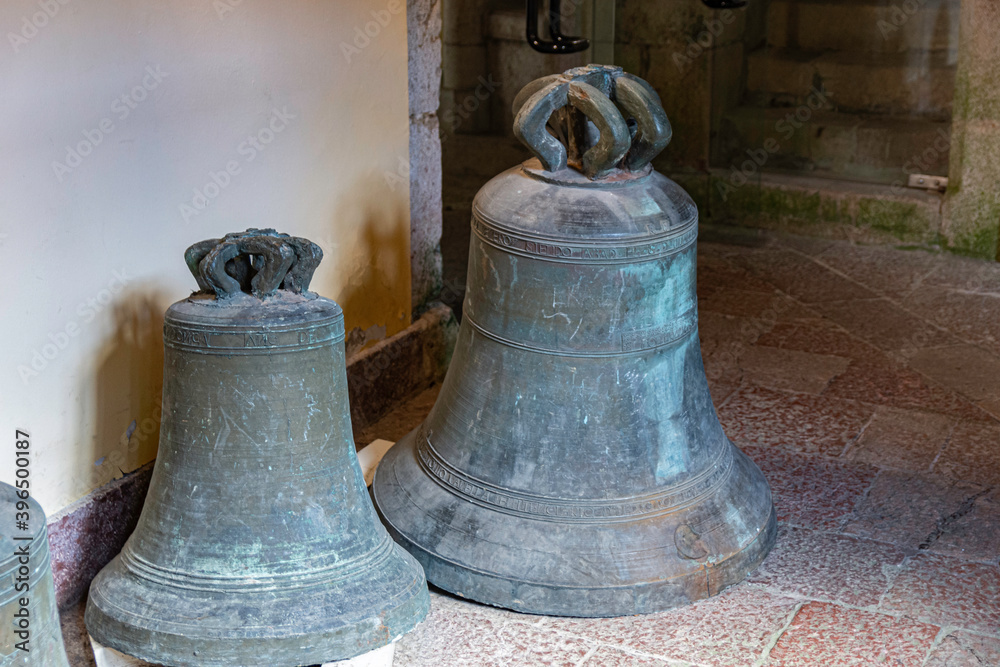 Obraz premium detail of old bells of a steeple. These are on the ground