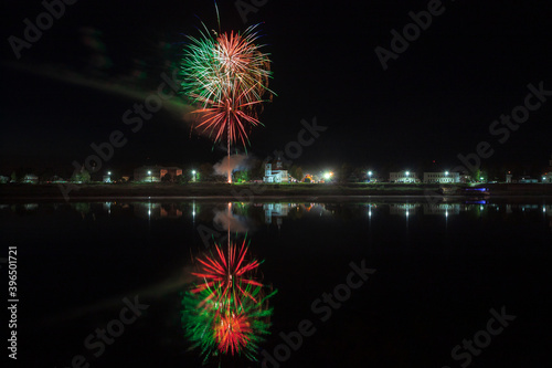 salute over the ancient city is reflected in the river