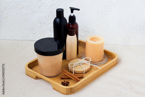Beauty products for aromatherapy in Spa salon. Body treatment. Wellness concept. Oil, soap, cream, shampoo with spices