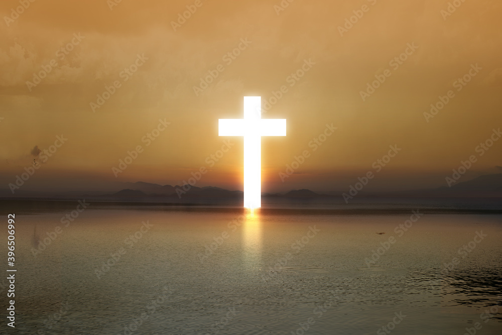 Christian Cross on the edge of the lake