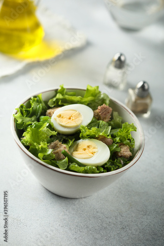 Healthy green salad with tuna and eggs