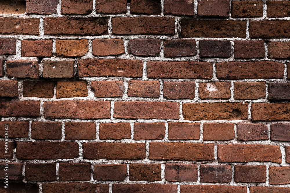 Obraz premium brown brick wall with darkened edges