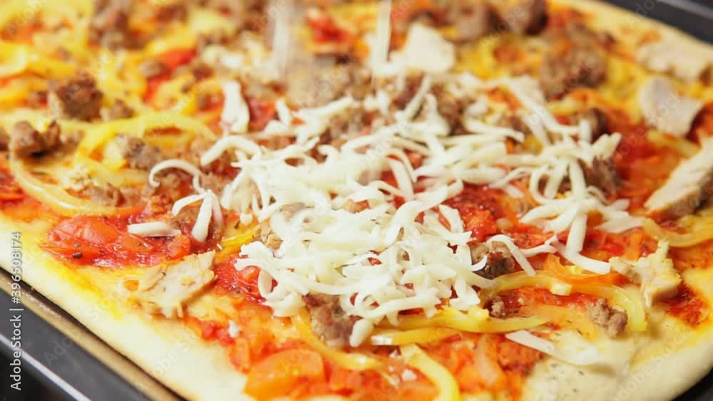 cheese for homemade pizza close-up cooking. cheese for homemade pizza close-up cooking.