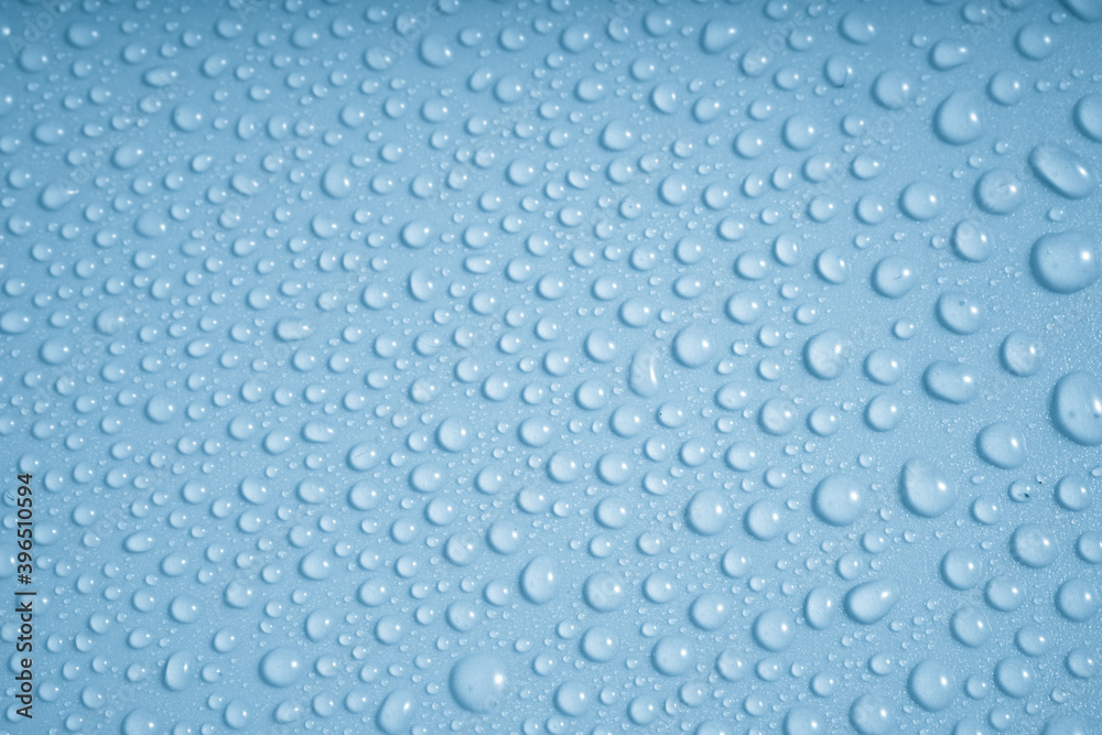 Water drops on blue background