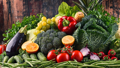 Fototapeta Naklejka Na Ścianę i Meble -  Composition with variety of raw organic vegetables and fruits