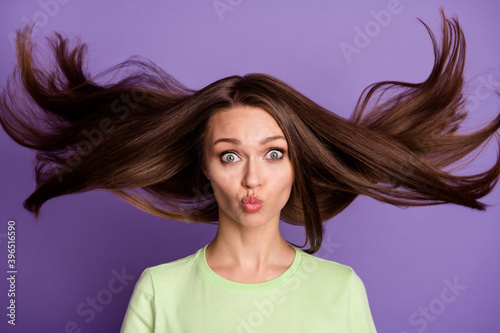 Close-up portrait of her she nice-looking attractive girlish funky comic cheery girl sending air kiss blowing clean smooth silky hair isolated bright vivid shine vibrant lilac violet color background