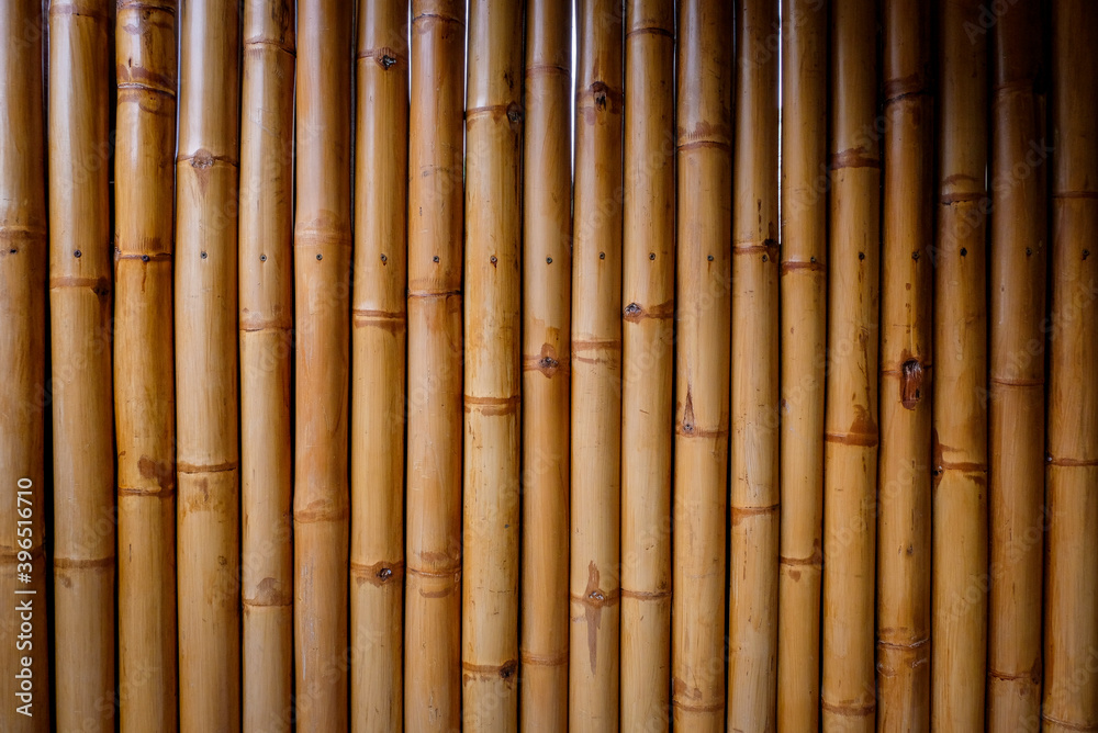 Fototapeta premium Old brown tone bamboo plank fence texture for background