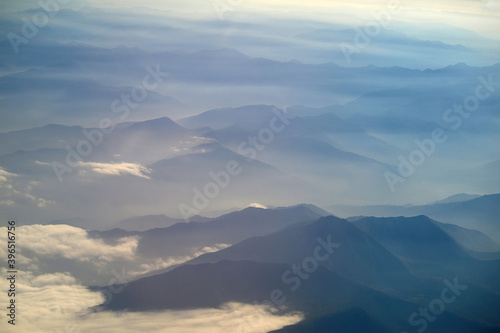 View from the plane on a mountain range
