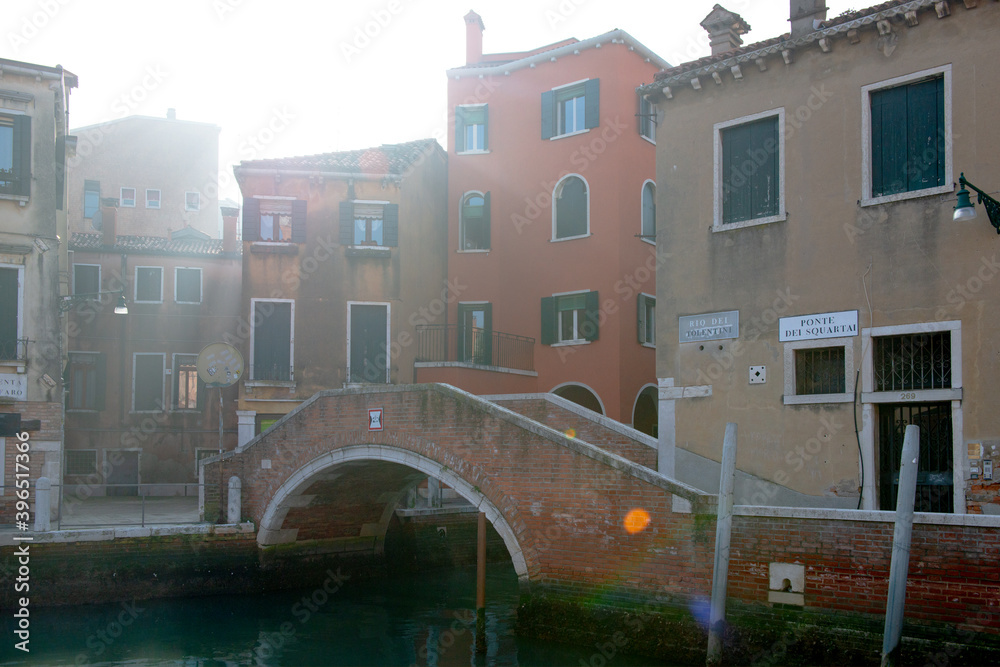 Picturesque view of ancient buildings, bridge and channel in Venice, Italy. Beautiful romantic italian city