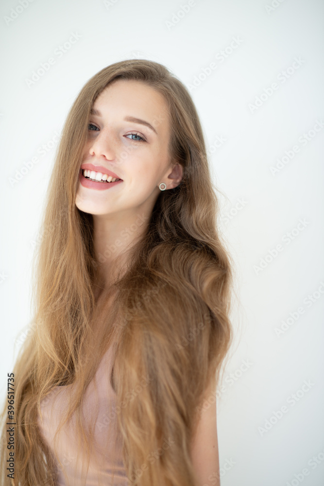 Portrait of a beautiful young woman with clean skin, beauty treatment, cosmetology and anti-aging theme Portrait of a beautiful young woman with clean skin, beauty treatment, cosmetology and anti-aging theme