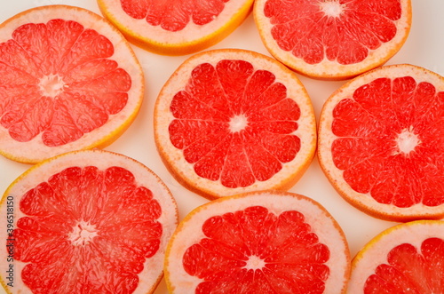 Slices Red grapefruit background, Citrus fruit background