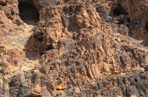 	Gran Canaria, landscapes along the hiking route around the ravive Barranco Hondo, The Deep Ravine at the southern part of the island, full of caves and grottoes, close to small village Juan Grande photo