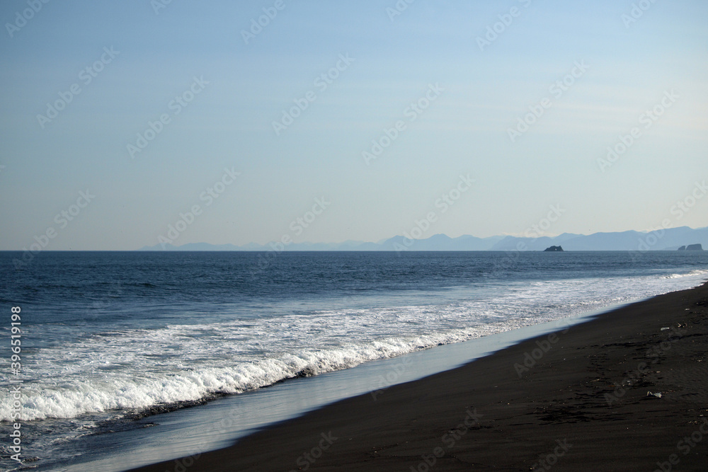 Kamchatka. Khalaktyrsky beach. Black volcanic sand beach on the Pacific Ocean. Archive photo, 2008