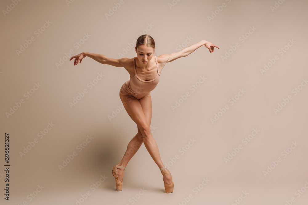 Beautiful young focused ballerina dancing gracefully on camera Beautiful young focused ballerina dancing gracefully on camera