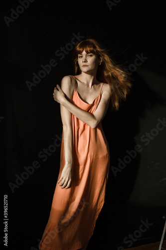 portrait of a woman with ginger hair and dress © Zaliya