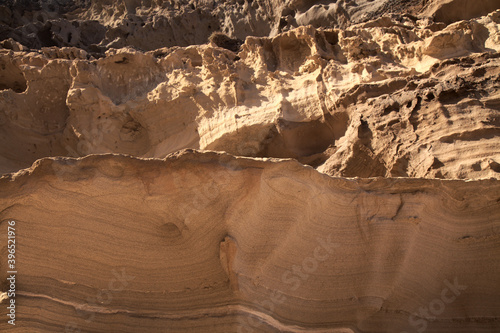 Gran Canaria, amazing sand stone erosion figures in ravines on Punta de las Arenas cape on the western part of the island, also called Playa de Artenara

b photo