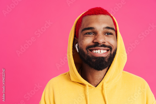 Happy african american guy in earphones smiling at camera © Drobot Dean