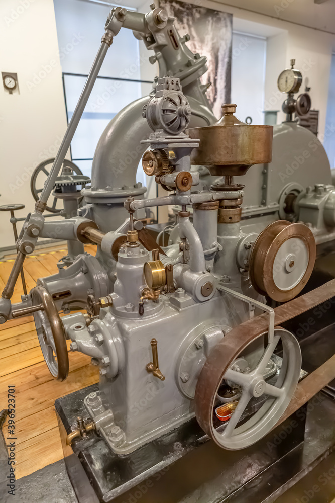 Detail of a classic 1934 industrial hydroelectric generator turbine