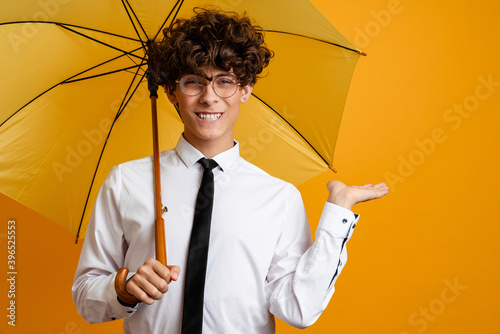 Confident young man wearing white shirt and tie photo