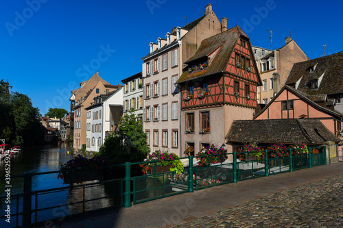 Old town water canal of Strasbourg, Alsace, France. Traditional half timbered houses of Petite France at dawn