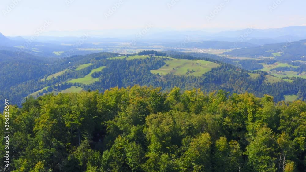 Landscape aerial view vast forest and mountains, Prevalje, Slovenia Landscape aerial view vast forest and mountains, Prevalje, Slovenia
