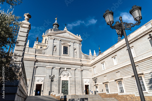 Beautiful view of Cathedral of La Almudena in Madrid on bright blue sky © jjfarq
