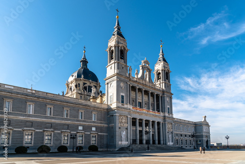 Beautiful view of Cathedral of La Almudena in Madrid on bright blue sky © jjfarq