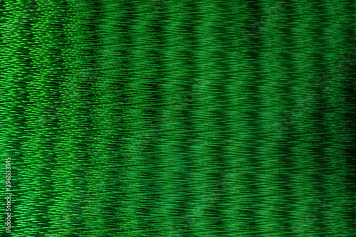 Abstract background of horizontally green neon glowing light shapes